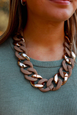 Tan and gold chain necklace
