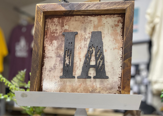 State sign with laser cut wood overlay